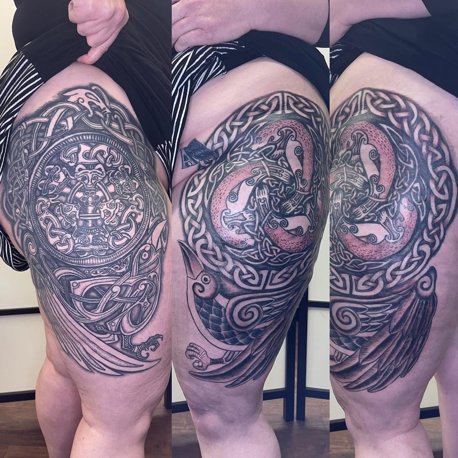 An ornate black and grey Celtic knotwork tattoo featuring a bird on the thigh, with intricate detailing and bold lines — by Sandra Price, los angeles