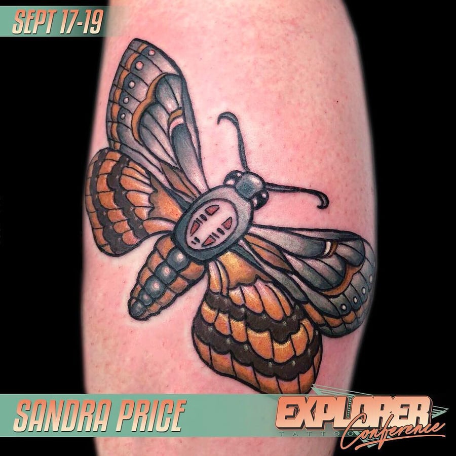 A bold neo-traditional moth tattoo on the arm with vibrant colors and graphic details — by Sandra Price, los angeles