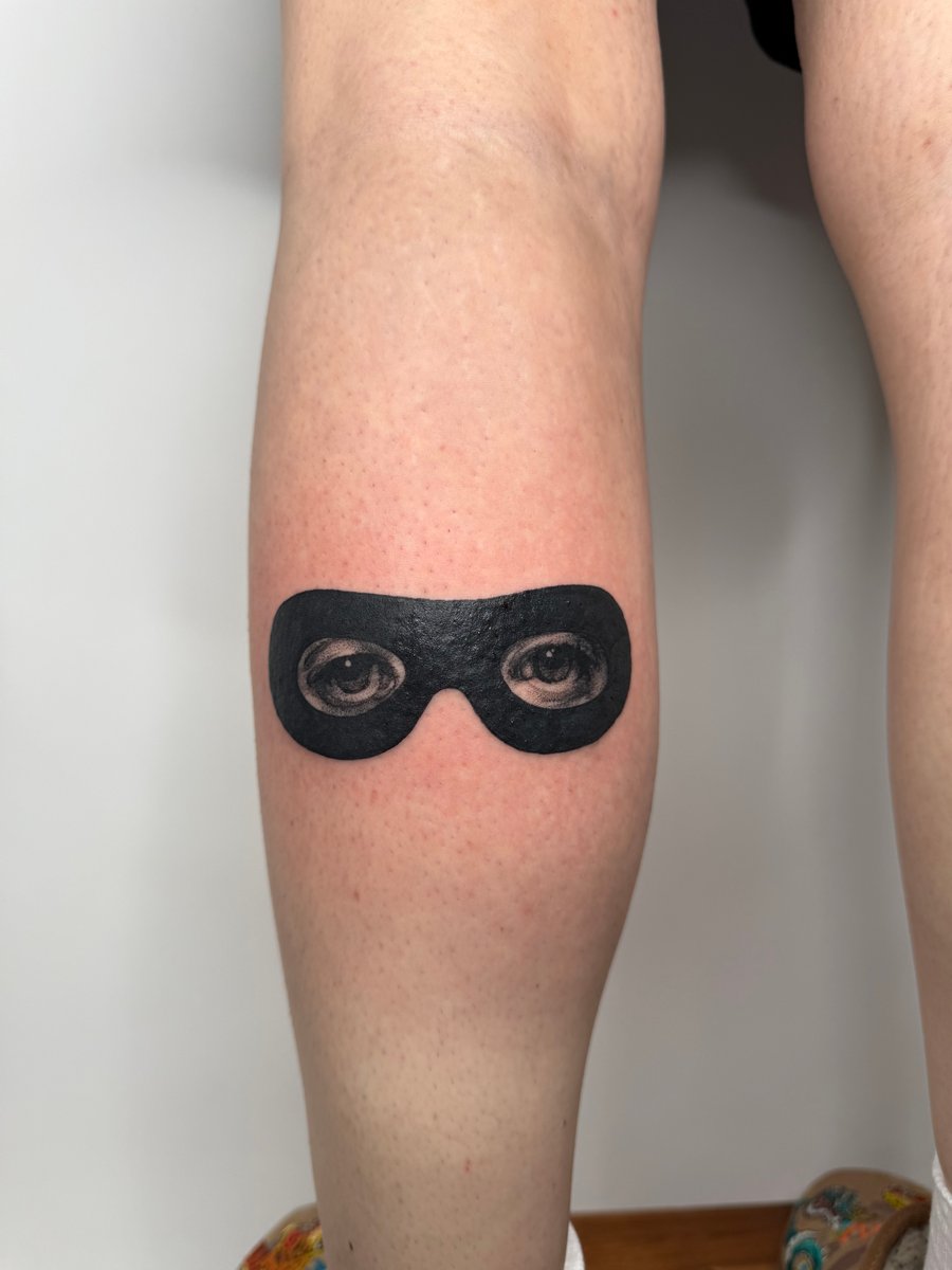 realism eyes with mask tattoo — by Level tattoo, los angeles