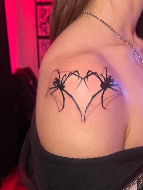 blackwork spiders forming a heart tattoo — by Vince Espinoza, los angeles