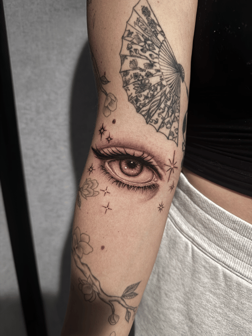 black & grey eye with decorative elements tattoo — by Shelby Bianco, los angeles