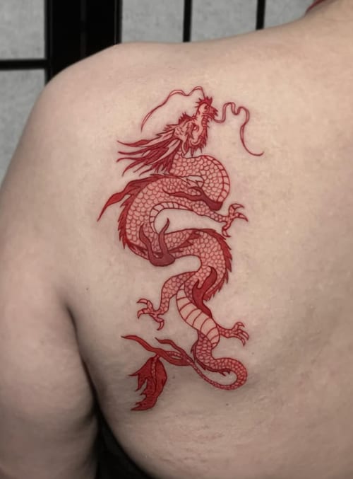 A fine line red dragon tattoo on the back, featuring intricate details and flowing lines in a Japanese style — by Shelby Bianco, los angeles