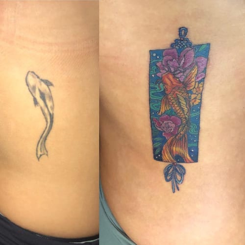 A colorful Japanese-style tattoo of a koi fish with flowers on the rib, featuring intricate details and vibrant colors — by Sandra Price, los angeles