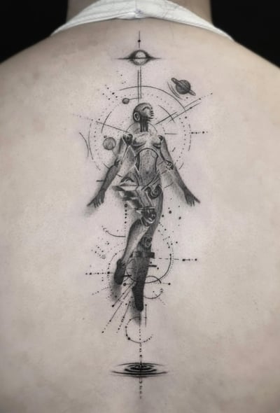 A black and grey surrealistic tattoo on the back featuring a humanoid robot figure surrounded by celestial elements and geometric patterns, with intricate dotwork detailing — by Jian Liang, los ang…