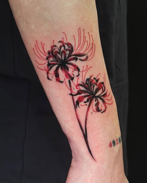 An illustrative tattoo of two flowers on the forearm, featuring black and red ink with a bold, graphic style — by Jian Liang, los angeles