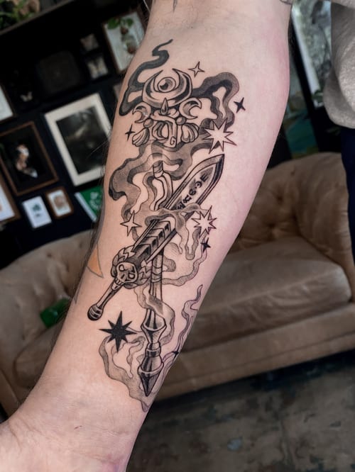 blackwork dagger with eye and smoke tattoo — by katlyyons, los angeles