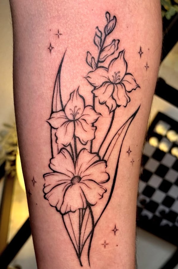 A fine line black and grey tattoo of flowers on the forearm, featuring delicate outlines and subtle shading — by NJ TATTOOZ, corona, ca