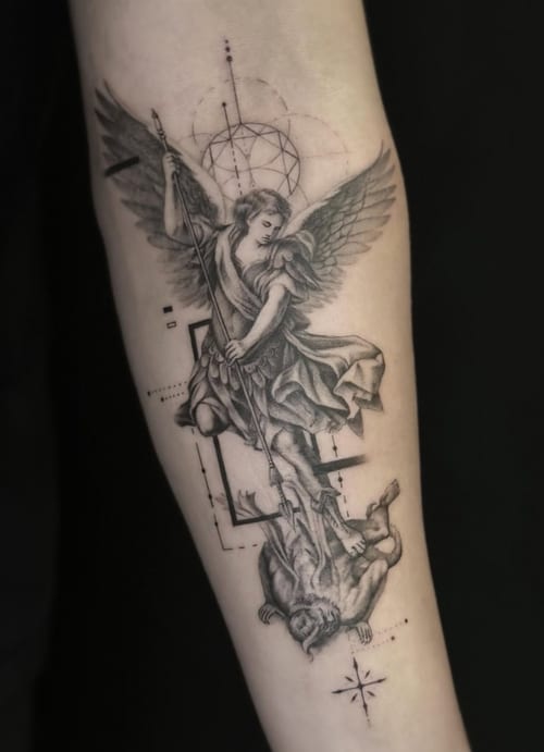 A detailed black and grey tattoo on the forearm depicting an angel defeating a demon, with realistic shading and dotwork elements — by Jian Liang, los angeles