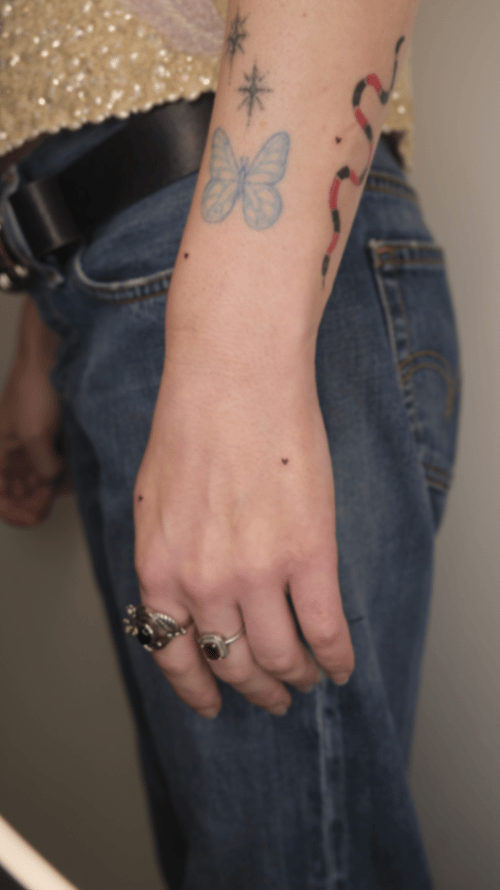 minimalist butterfly and snake tattoo — by Samantha Wilks, los angeles