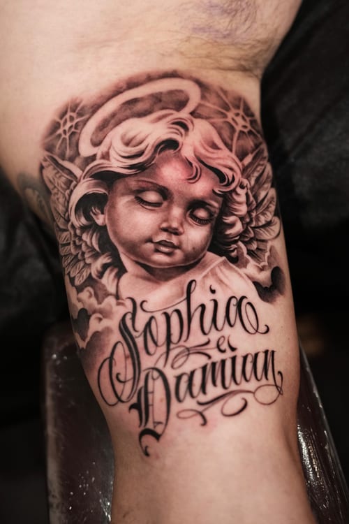 realism angel tattoo — by Johnny Ayala, los angeles