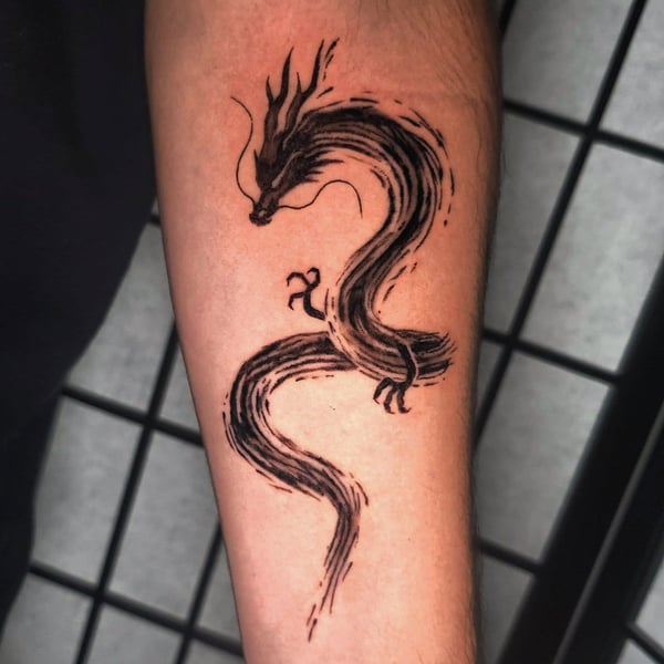 A bold blackwork dragon tattoo on the forearm, featuring a flowing Japanese style design — by Miguel ANGELO, temecula, ca