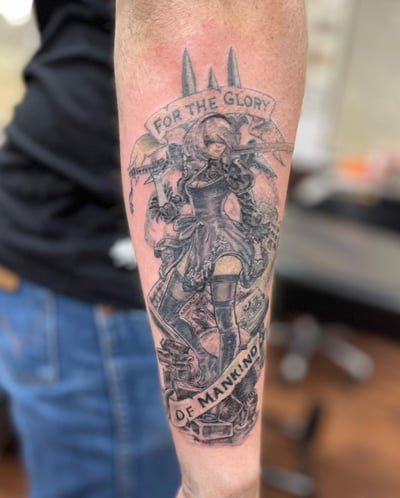 A bold black and grey tattoo of an anime character with a sword on the forearm, featuring a graphic style and a quote — by Sandra Price, los angeles