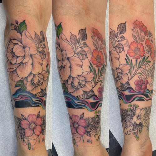 A colorful floral arrangement tattoo on the forearm featuring various flowers with delicate and ornate details — by Sandra Price, los angeles