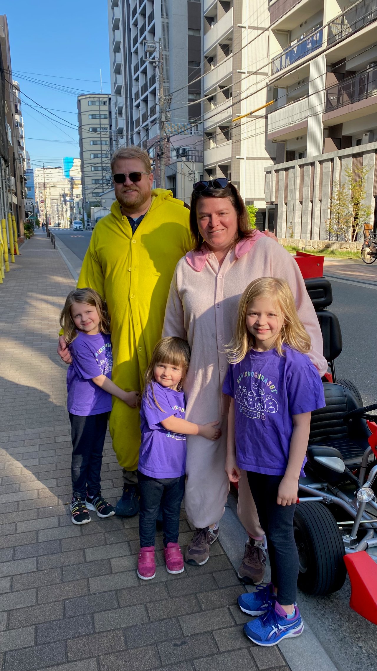 Adam, Lindsay, Lily, Cora and Harper posing together before the go kart tour in Tokyo