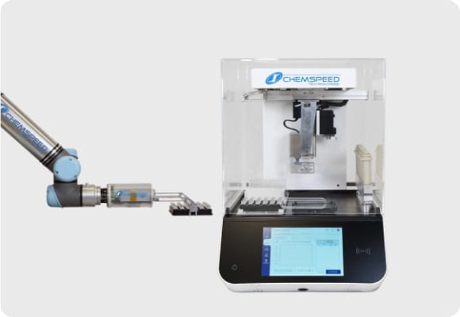 A robotic arm delivering a tray of glass vials to a Chemspeed vial weighing robot with a touch screen