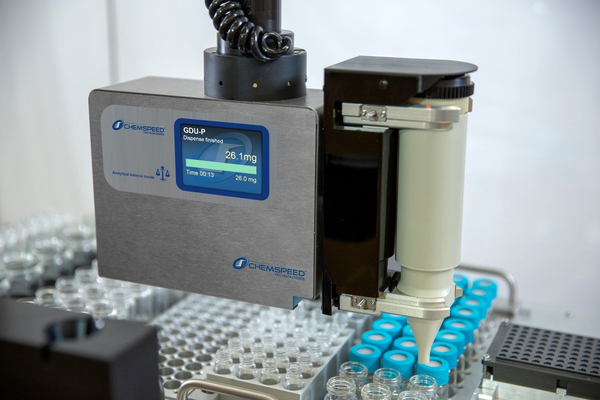 Close-up of a gravimetric dispensing unit moving. Powder dosing.