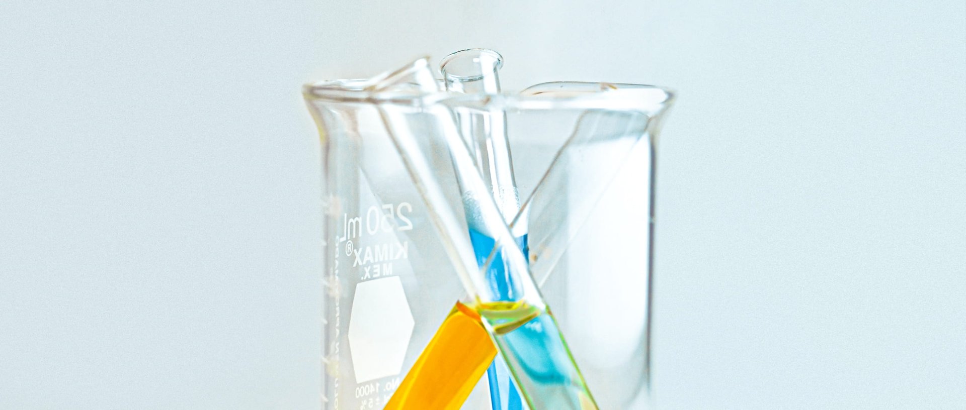 Chemistry test tubes in a mesuring container