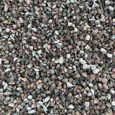 Overhead photo of wet Missoula Crushed River Rock in the 0.75 inch size, ready for delivery.