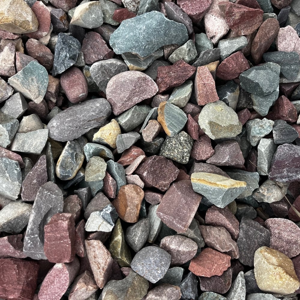 Crushed river rock (1.5” rainbow)