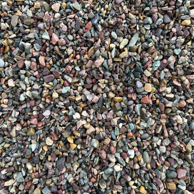 Overhead photo of wet Missoula Pea Gravel in the 3/8 inch size, ready for delivery.