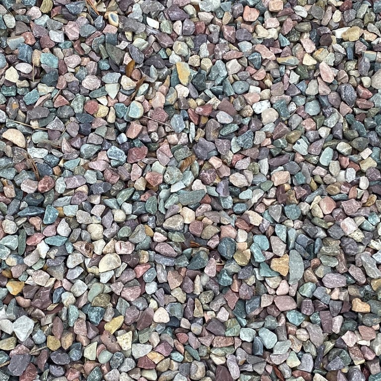 Overhead view of Missoula crushed river rock after it has been spread and rain has washed off the dust.