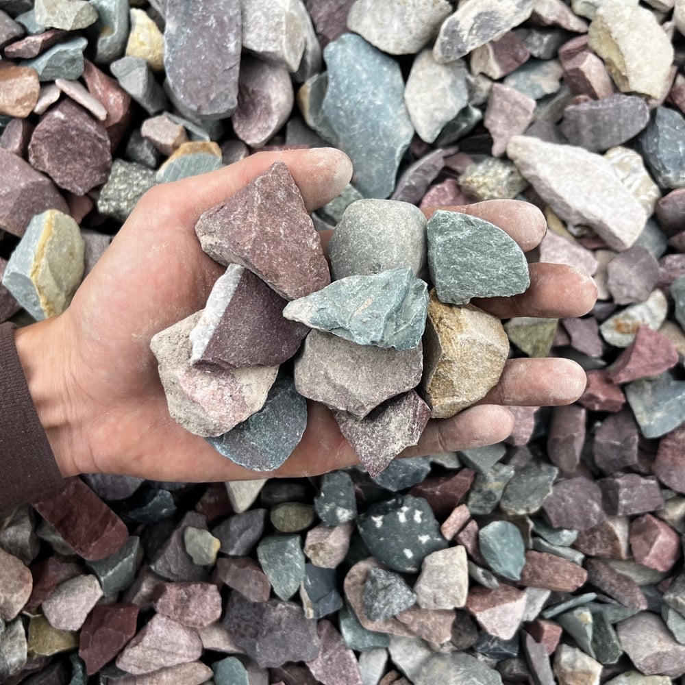 Crushed river rock (1.5” rainbow)