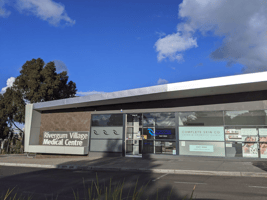 Image of Rivergum Village Medical Centre entrance with the Lifelong symbol in a window.