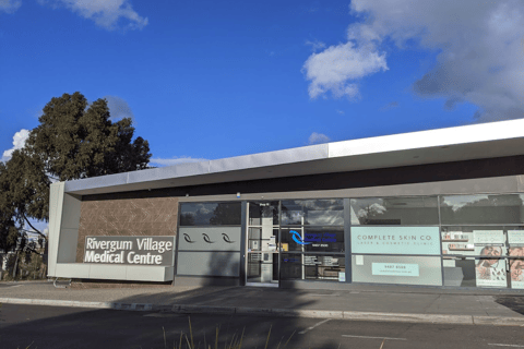 Image of Rivergum Village Medical Centre entrance with the Lifelong symbol in a window.