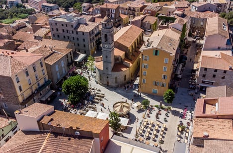Where should you go in southern Corsica for authentic villages? 
