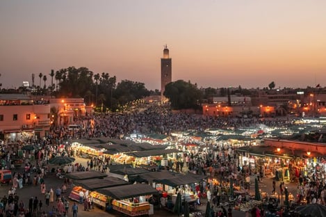 Take in the bustling Jemaa el Fna square at night