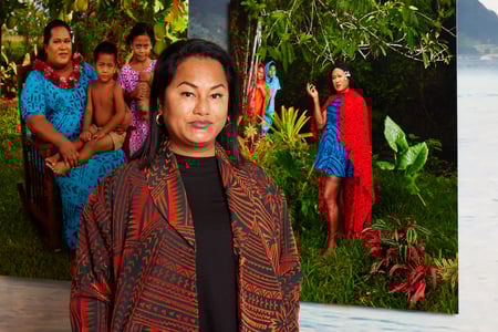 Artist Yuki Kihara in front of her art