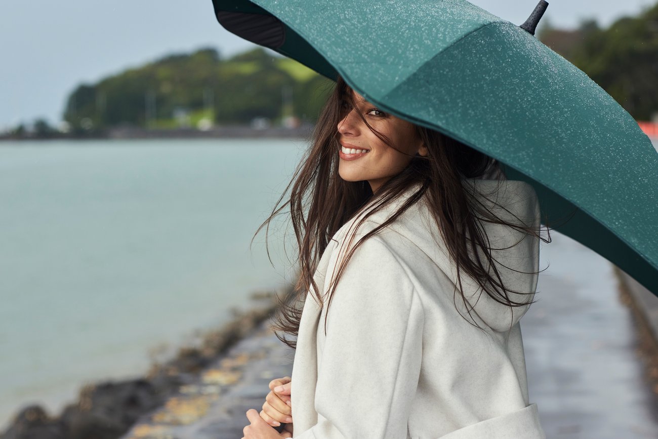 Girl using a BLUNT umbrella