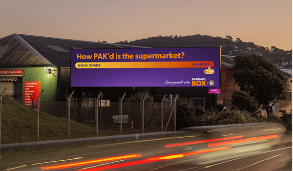 Lumo billboards remind Kiwis to skip the supermarket chaos for Bargain Box