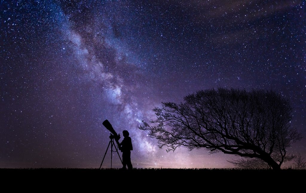 Telescope Astronomer under the stars