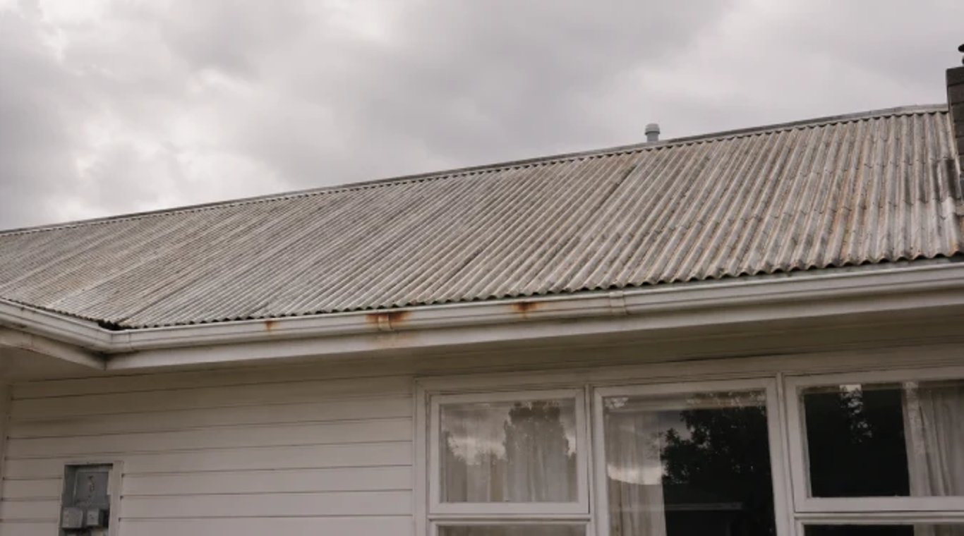 Rust developing on an ageing corrugated metal roof