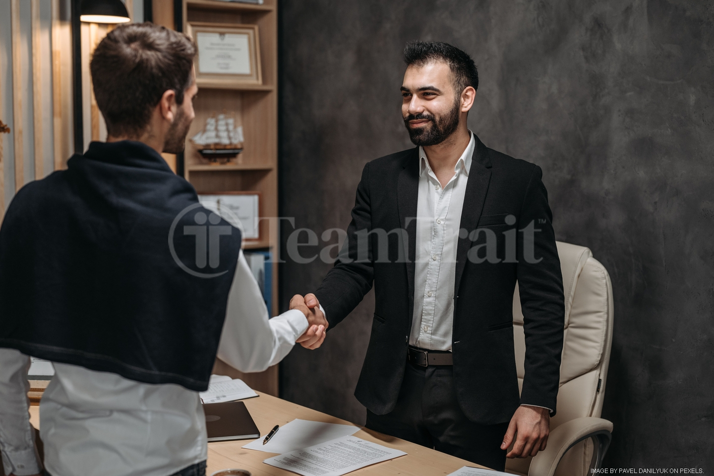 twomenhandshake
