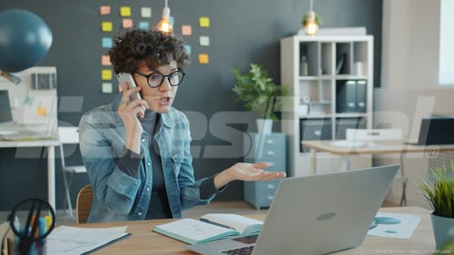 frustrated woman on phone