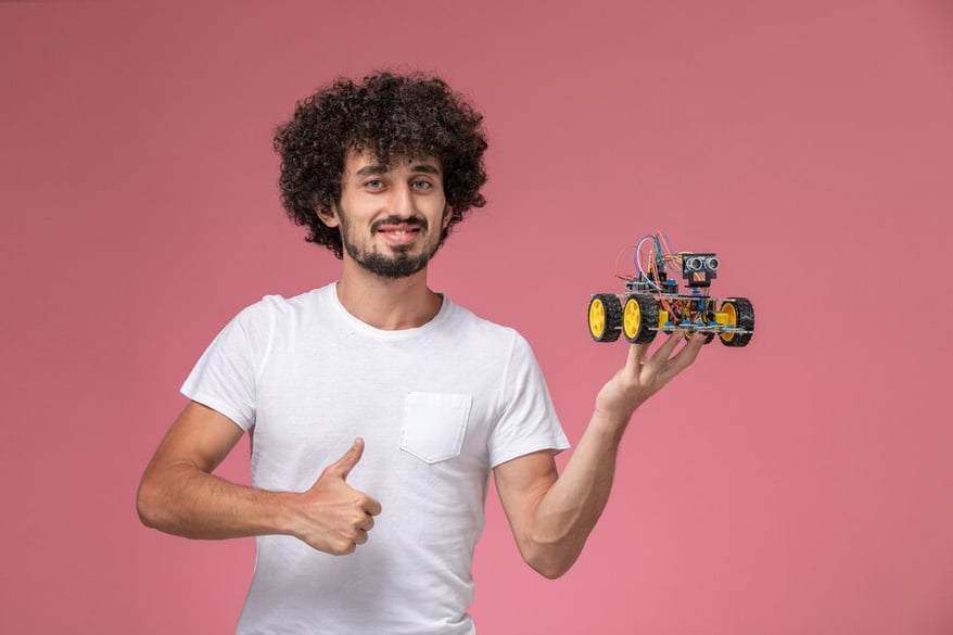 front-view-young-man-thumbs-up-new-innovation_140725-34753