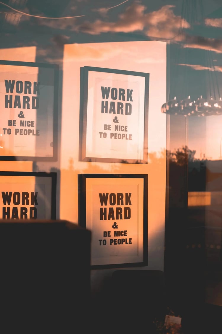 framed picture with words: work hard and be nice to be people