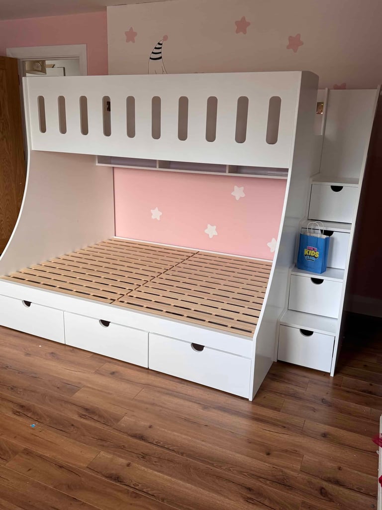 double and single bunk bed with stairs side view