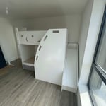 Single bunk beds with storage and slide