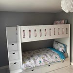 Single bunk bed with mattress and storage