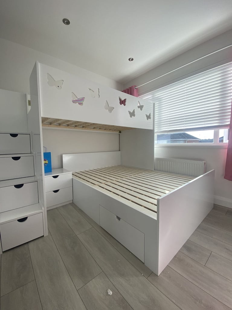 L-shaped double single bunk bed with butterfly cutouts