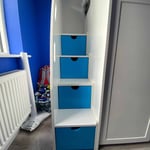 Double bunk beds with stairs and safety rails