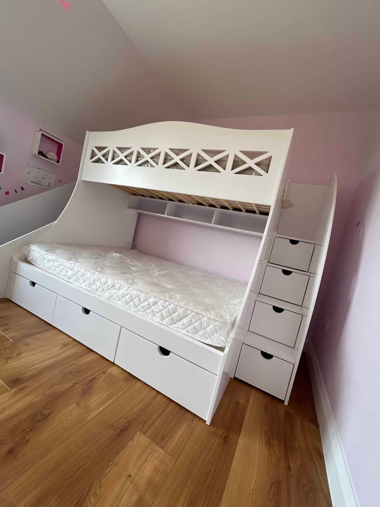 Double and single bunk bed with built-in storage shelves