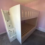 Double bunk beds with compact stairs