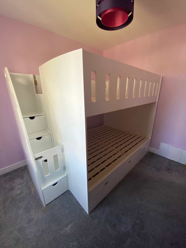 Double bunk beds with compact stairs