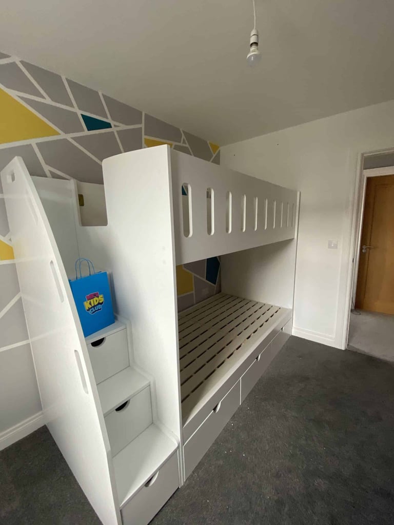Single wooden bunk beds with stairs