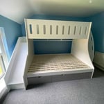 Slide bed