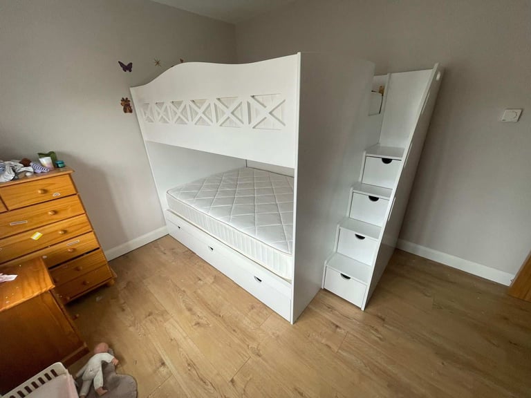 Single over double bunk bed with stairs and safety features